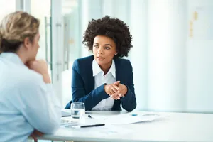 Women meeting at a conference table